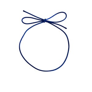 May include: A dark blue cord tied into a bow at the top, forming a loop. The cord is against a white background. The bow is centered at the top, with the cord forming a circle below.