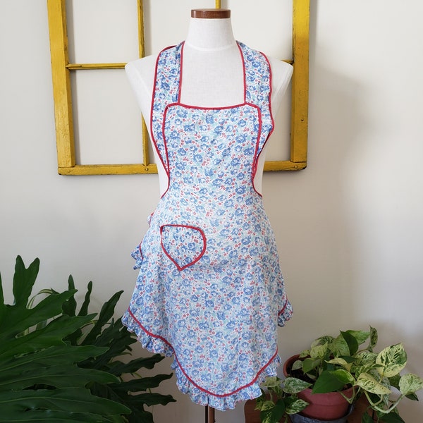 1960s handmade cotton bib apron, blue and red floral pattern of roses and daisies, tie waist, halter neck, ruffle skirt, plastic free