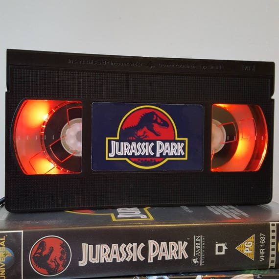 Lampe de table lumineuse en forme de cassette Jurassic Park