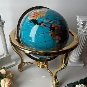 14” Turquoise Globe inlaid with semi precious stones Gold tone metal with compass on base