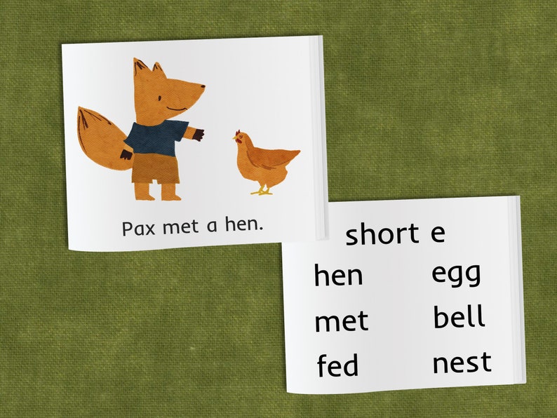 May include: A fox with a blue shirt and brown shorts meets a hen. The words "Pax met a hen." are written below the image. The second image shows the words "short e" at the top and a list of words with the short e sound: hen, egg, met, bell, fed, nest.
