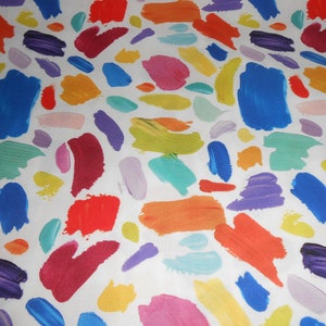 Könnte beinhalten: Ein weißer Hintergrund mit bunten abstrakten Farbflecken in verschiedenen Formen und Größen. Die Farben umfassen Rot, Orange, Gelb, Grün, Blau, Lila und Pink.