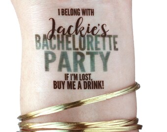 May include: A temporary tattoo with the text "I belong with Jackie's Bachelorette Party. If I'm lost, buy me a drink!"