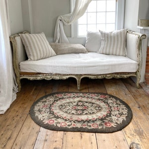 Floral design vintage hooked rug textile area carpet oval muted tones Faded The Textile Trunk eco-friendly