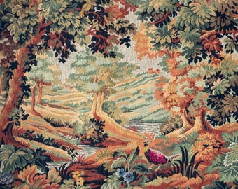 May include: A detailed tapestry depicting a forest scene with a pheasant. The artwork features a variety of colors, including greens, browns, and oranges, creating a rich and textured appearance. The scene includes trees, foliage, and a small stream, with a pheasant in the foreground.