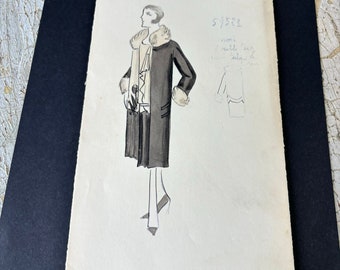 May include: A black and white fashion illustration of a woman wearing a long coat with a fur collar and cuffs. The illustration is on a white paper background with the number 57522 and some handwritten text.
