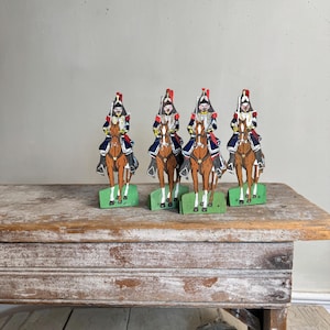 4 ( 8 avail) Antique vintage French Cuirassier soldiers set of 4 mounted cavalry with swords drawn hand painted decorative figures