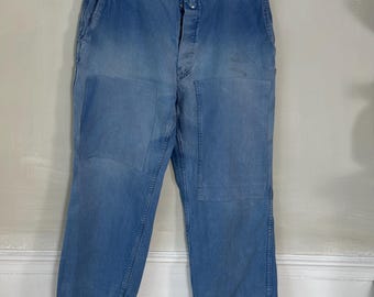38 French Vintage blue workwear pants trousers distressed Patched mends repairs repaired ecofriendly recycled upcycled clothes denim Boro