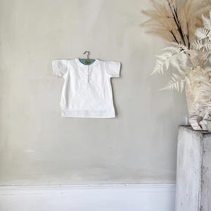 1 ( 3 avail.) Child&#39;s French c1900 white shirt button cotton organic country farmhouse shabby interior design wall hanging art eco-friendly