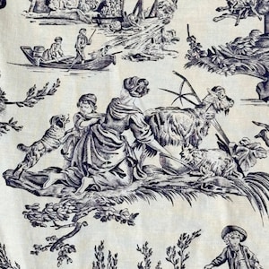 May include: A black and white toile fabric pattern featuring a woman and child with a dog, a goat, and a boat with people in it. The background is a cream color.