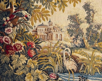 May include: A detailed tapestry depicting a serene landscape with a classical building, lush foliage, and a bird perched on a branch. The scene includes a body of water with a heron. The color palette features greens, blues, and earth tones.