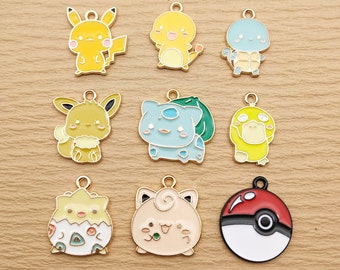 May include: Nine gold-colored metal charms featuring different Pokemon characters. The charms are painted with various colors, including yellow, blue, red, and green. The charms are perfect for adding a touch of whimsy to jewelry, keychains, or other crafts.