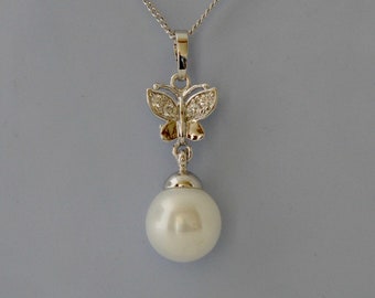 necklace with pearl pendant and butterfly decor