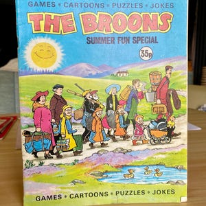 May include: A vintage copy of "The Broons Summer Fun Special" comic book. The cover shows a cartoon family on a walk, with a smiling sun. The cover is blue with the text "Games, Cartoons, Puzzles, Jokes." The price is 35p.