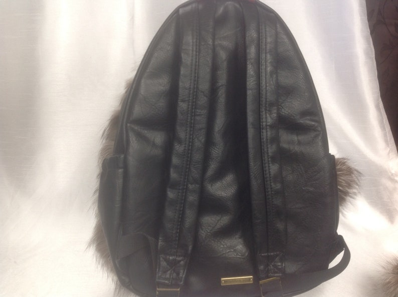 Black backpack with recycled silver fox fur