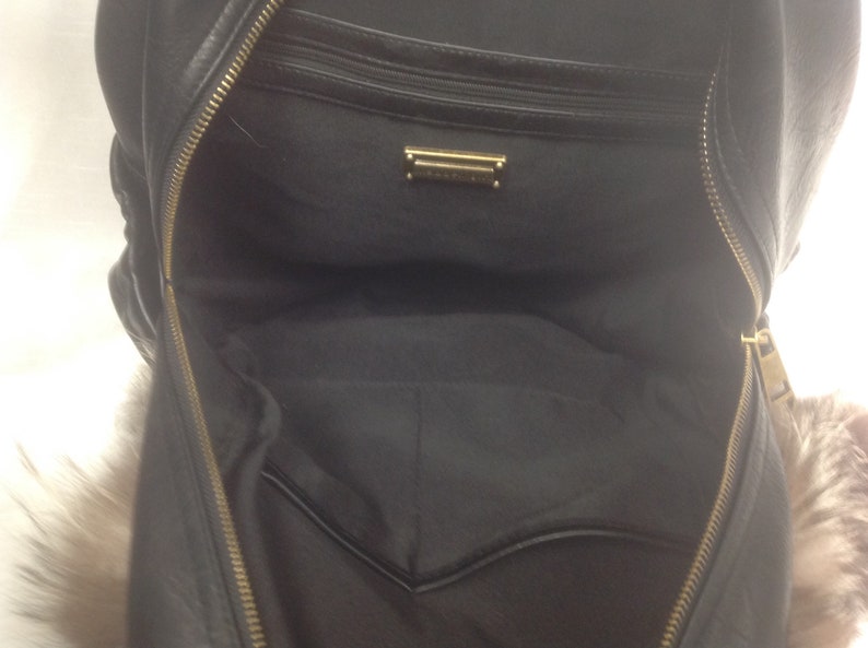 Black backpack with recycled silver fox fur