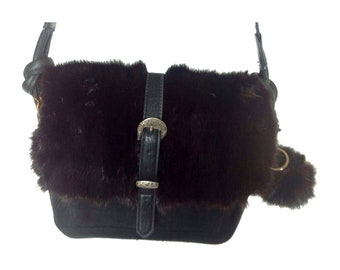 Leather and recycled black mink fur handbag