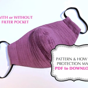 Peut inclure: Un masque facial en tissu violet avec des boucles d'oreille élastiques. Le masque a un motif et des instructions sur la façon de réaliser un masque de protection. Le texte "PDF à TÉLÉCHARGER" est sur l'image.