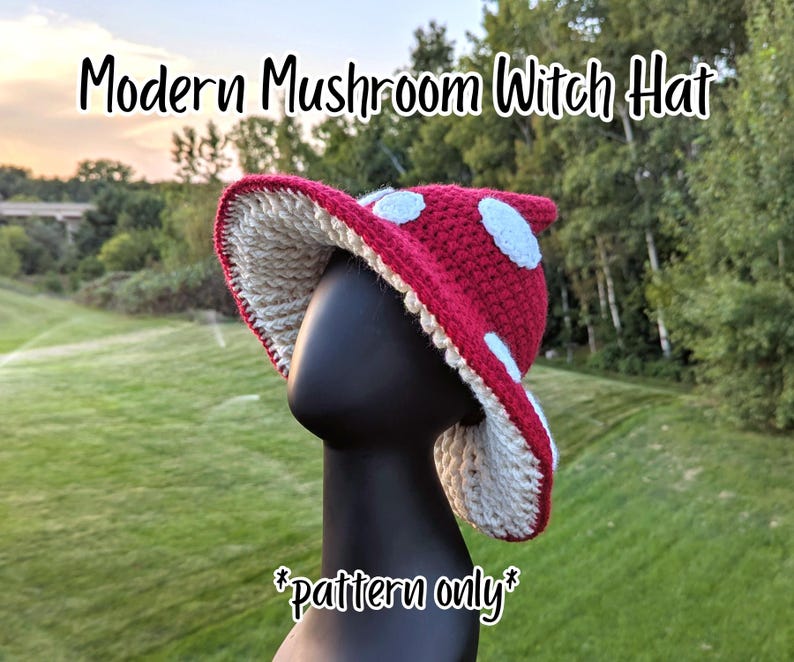 May include: A red and white crochet mushroom witch hat with a wide brim and white polka dots. The hat is displayed on a black mannequin head against a green background. The text "Modern Mushroom Witch Hat" and "pattern only" are visible.