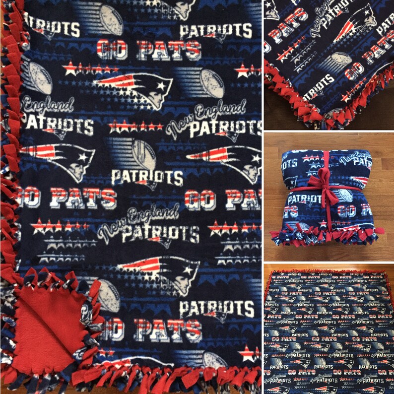 May include: A blue and red fleece blanket with the New England Patriots logo and the words "Go Pats" repeated throughout. The blanket is tied with a red ribbon and has red fringe around the edges.