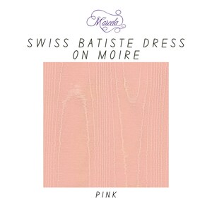 May include: A square swatch of pink Swiss batiste fabric featuring a moire pattern. The text at the top reads Marcela, SWISS BATISTE DRESS ON MOIRE, and the word PINK is printed at the bottom of the image, identifying the color of the textile.