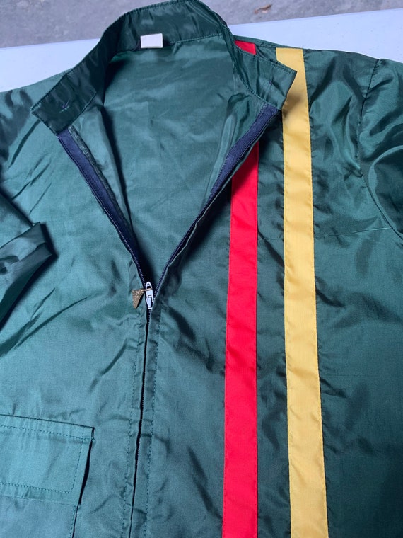 Green red store and yellow jacket