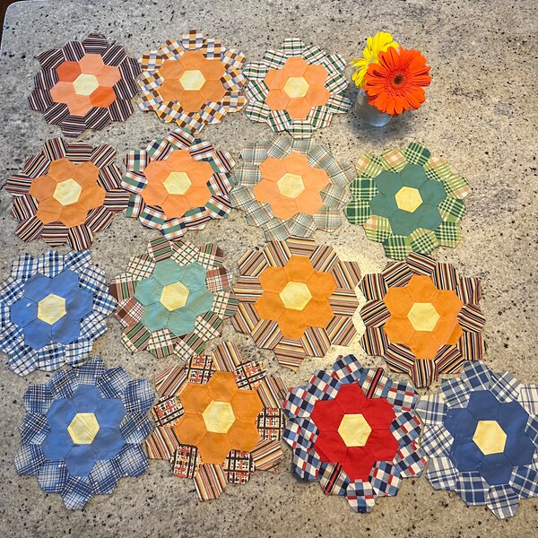 Vintage Lot of 15 Hand Stitched Grandmas Flower Garden Quilt Blocks Pieces Flowers   Dimensions Aprox 9” X 7 1/2”each hand stitched