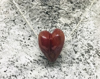 Red blown heart pendant on sterling silver chain