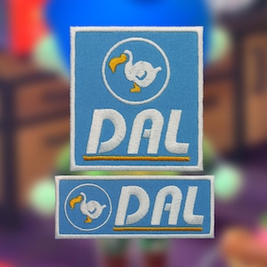 May include: Two embroidered patches featuring a blue background with a white dodo bird logo and the text "DAL" in white. The top patch is larger and has a circular logo, while the bottom patch is smaller and has a square logo.