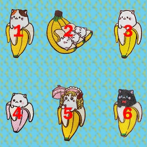 Puede incluir: Seis parches bordados para planchar con gatos en plátanos. Los gatos están en varias poses y tienen diferentes expresiones. Los parches están numerados del 1 al 6.