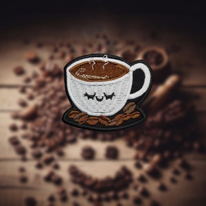 May include: A white coffee cup with brown coffee inside and a black outline. The cup has a smiling face with closed eyes. The cup is on a brown background with coffee beans.