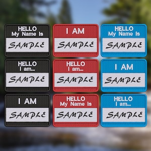 May include: Nine embroidered iron-on patches with different colors and text. The patches say "Hello My Name Is SAMPLE", "I AM SAMPLE", "Hello I am... SAMPLE".