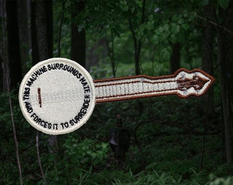 New! Seeger This Machine Surrounds Hate