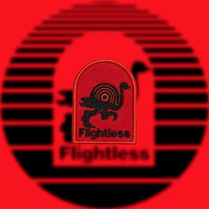 May include: Red embroidered patch with a black ostrich design and the word "Flightless". The patch has an arched top and a black border. The background is red with a blurred black design.
