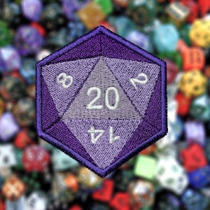 May include: Purple 20-sided die with white numbers, 3, 12, 20, and 14, embroidered on a fabric patch.