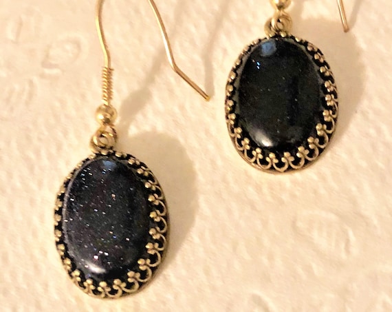 Blue Goldstone earrings in a brass crown setting with 14K gold-filled French ear wires.