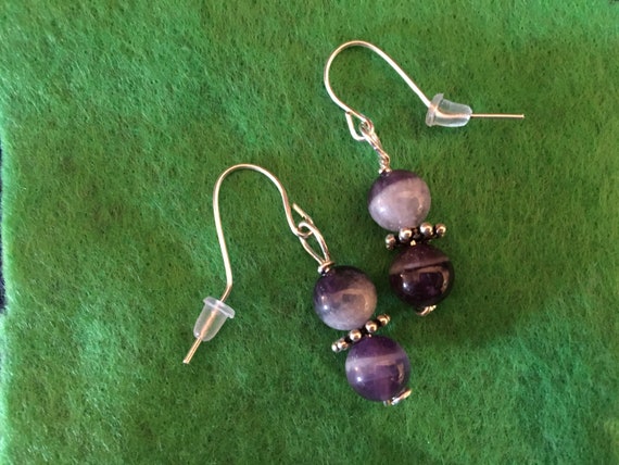 Dog Tooth Amethyst Bead Earrings wrapped with Sterling Silver Wire.
