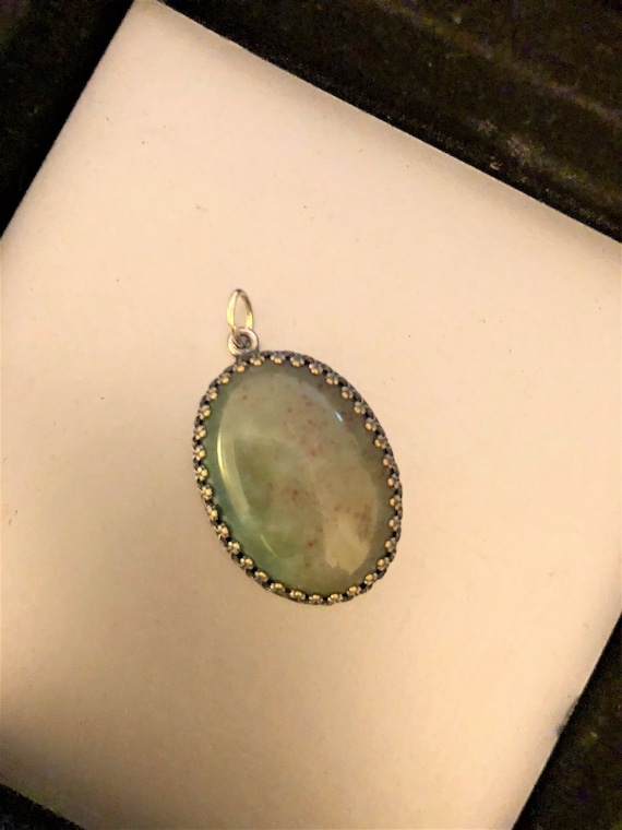 Fancy Jasper Cabochon encased in a Silver Plated Setting