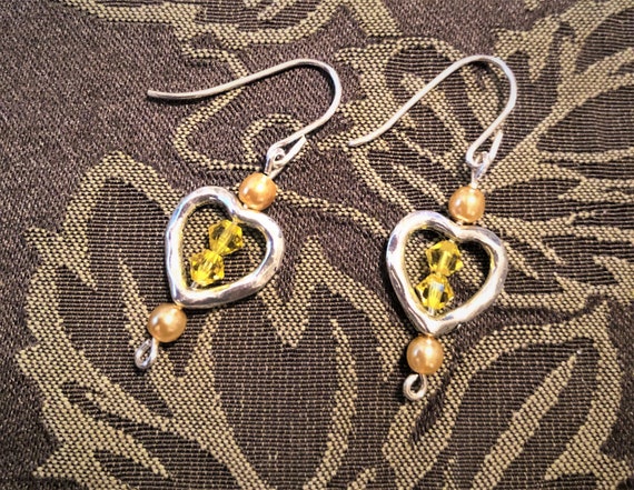 Yellow Swarovski Crystal Earrings with Czech Pearls in a Silver Plated Heart Frame.