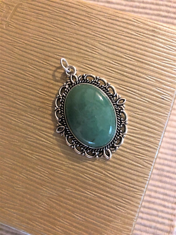 Aventurine Pendant encased in a Silver Plated Setting.