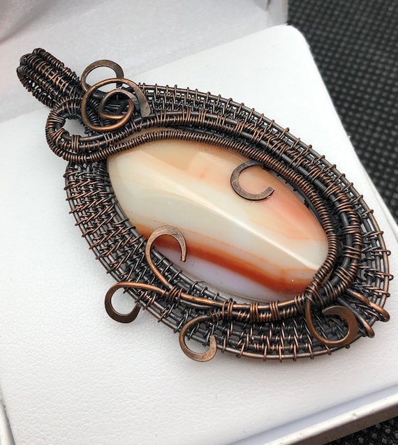 Stunning Carnelian wire woven Bead with Copper Wire.