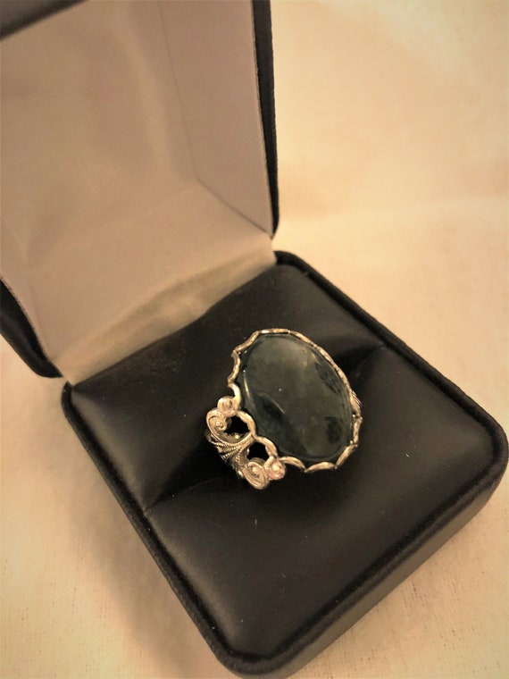 Moss Agate Adjustable Ring in a White Plated .Filigree Setting