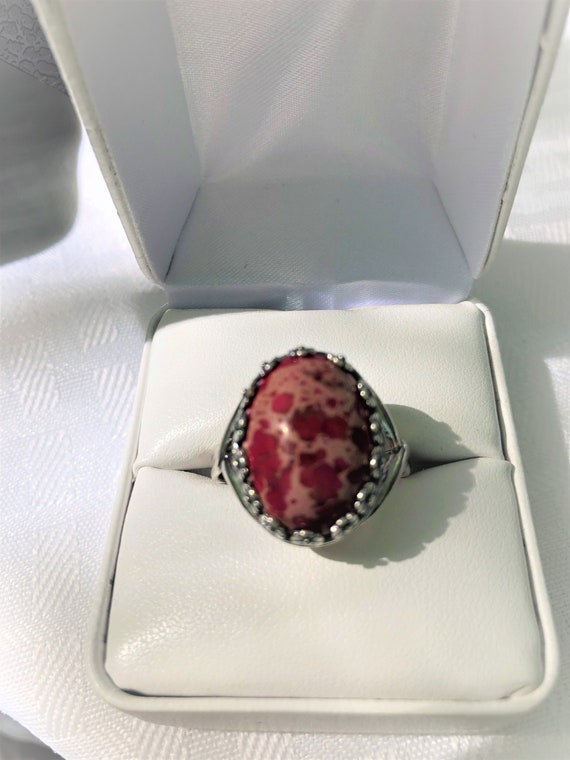 Red Sea Sediment adjustable Ring in a Silver Plated Floral Setting.