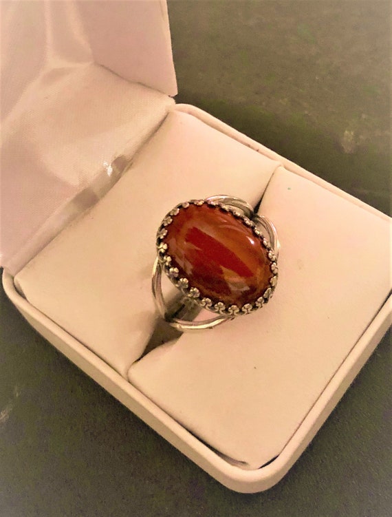 Red Jasper adjustable Ring encased in a Silver Plated Crown Setting.