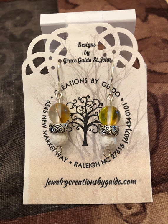 Aroma Therapy Earrings (yellow) featuring Lava Rock and wrapped with Sterling Silver Wire.