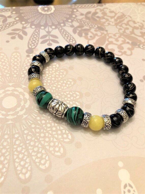 Malachite Stretch Bracelet with Yellow Jade Beads, Glass Beads and Pewter Spacers.
