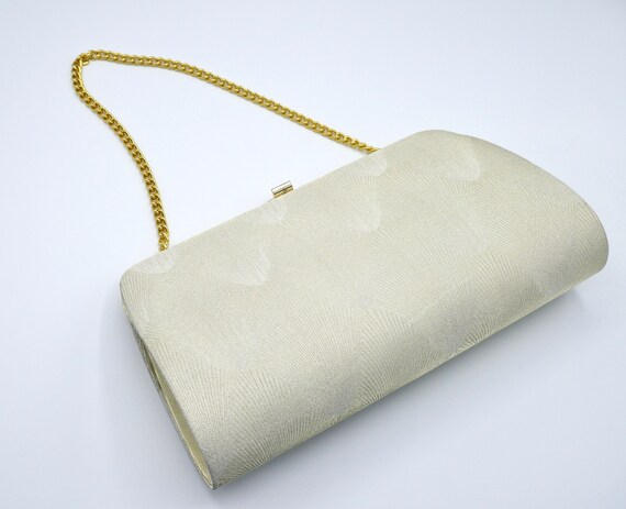 Champagne gold clutch bag hotsell