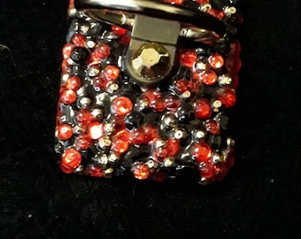 Red, black and gold cell phone ring