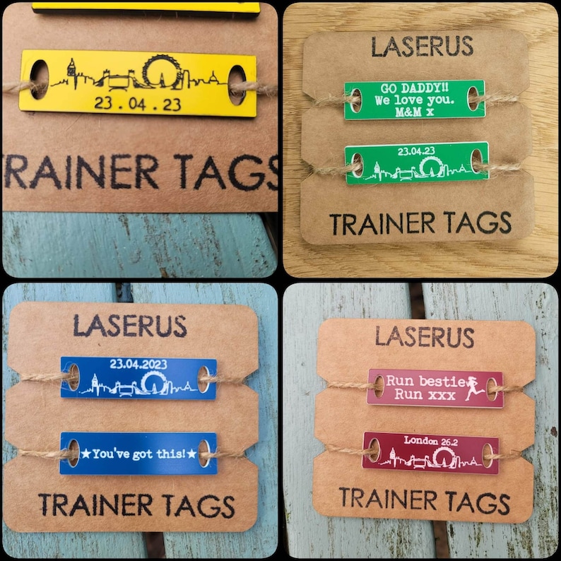 May include: Four brown card stock tags with white text and colorful rectangular labels attached. The labels feature various designs, including a London skyline, a running figure, and the text "GO DADDY!! We love you. M&M x". The tags are labeled "TRAINER TAGS" and "LASERUS".