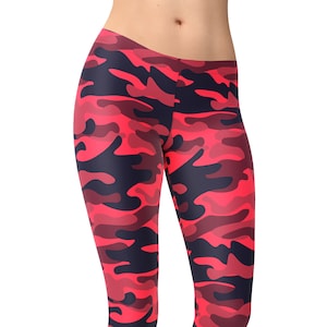 May include: Red and black camouflage leggings. The leggings are full length and have a tight fit.